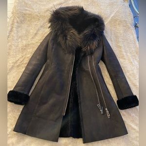 Women’s leather coat with real fur
